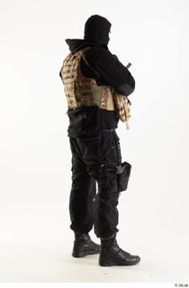 Arthur Fuller Contractor in Mask holding gun standing whole body…